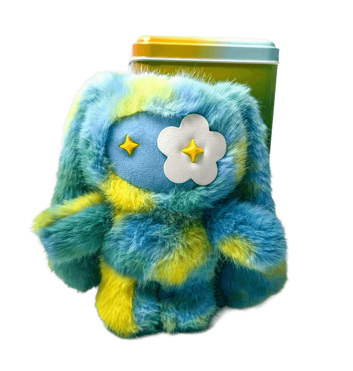 CJ Hendry, ‘Rainbow JUJU - Cookie’, 2026, Sculpture, Various plush Materials, Leather flower eye, Polyester filling, Metal clasp. Metal rainbow tin and fold out "map" poster + stickers. , null, 