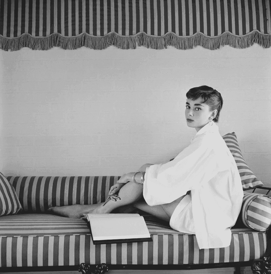 Mark Shaw, ‘Audrey Hepburn on Striped Sofa 1954’, 1954, Print, Pigment print on Hahnemϋhle photo rag paper, null, 