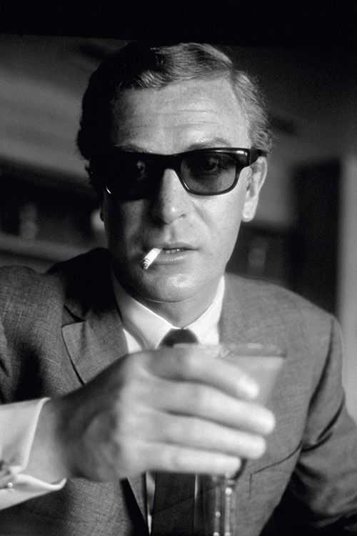 Terry O'Neill, ‘Michael Caine Cheers (Small) - Estate print’, 1966, Photography, Photography - Gelatin Silver Print, null, Numbered