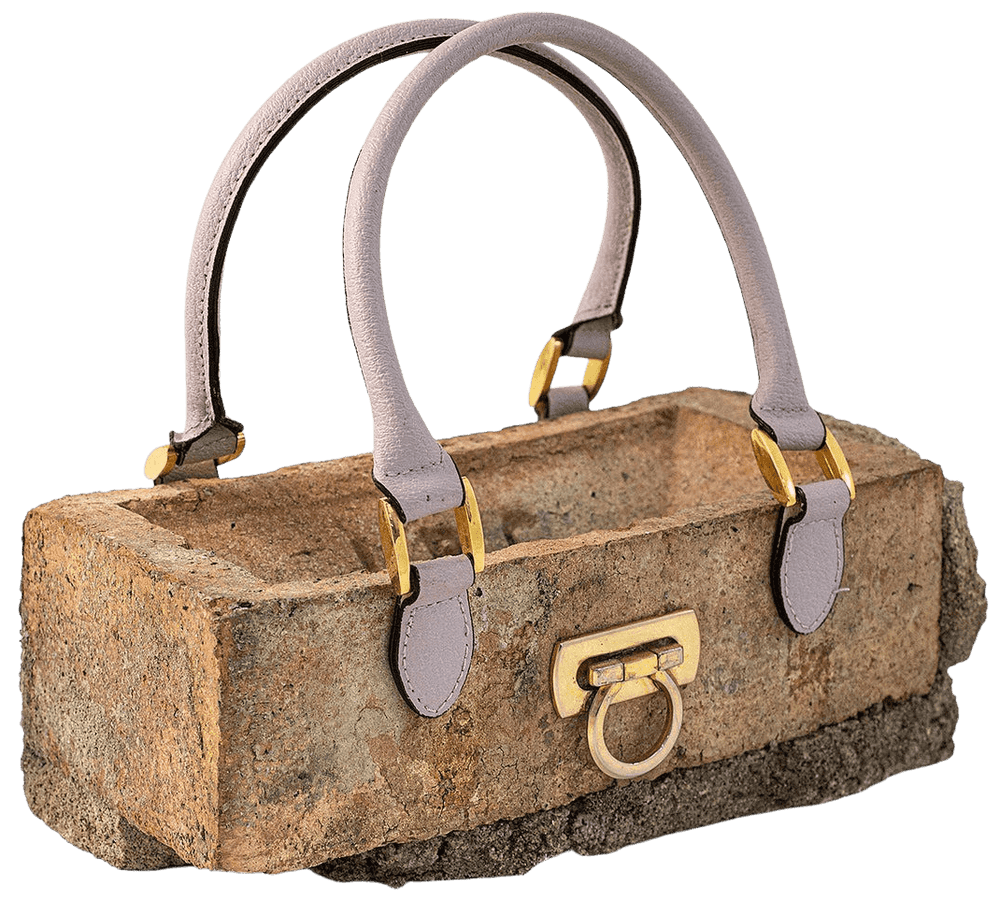 Banksy, ‘Clutch Bag’, 2019, Sculpture, This fashion forward accessory is made from a genuine real life house brick, Self-released, 