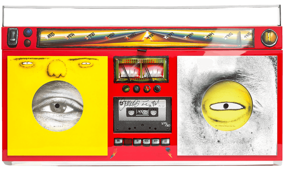 OSGEMEOS, ‘1983 - THE BOOMBOX’, 2017, Sculpture, Delivered in a collector box 1983. Inside the box: Wood lacquered boombox art piece hand signed by all 3 artists and hand numbered 1/300; two 7 inch vinyl records with 4 exclusive tracks records by Pharrell Williams and OSGEMEOS, Social Animals, Numbered, Dated