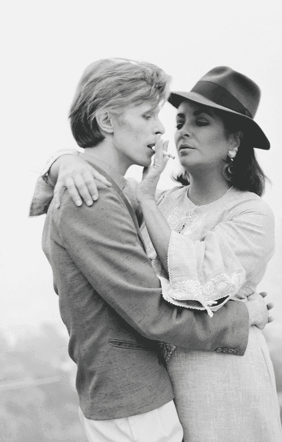 Terry O'Neill, ‘David Bowie and Elizabeth Taylor’, 1975, Photography, Silvergelatin, null, Numbered