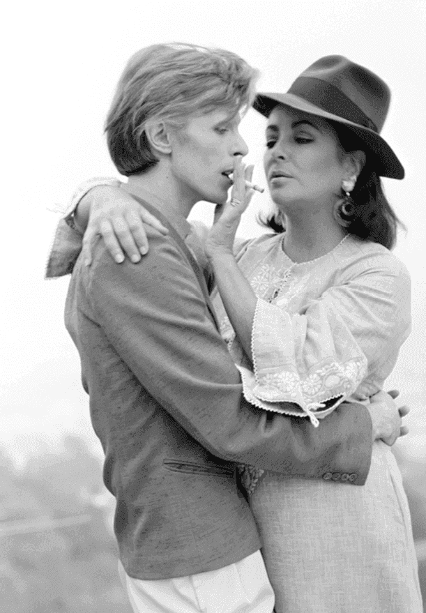 Terry O'Neill, ‘David Bowie with Elizabeth Taylor (Lifetime Signed)’, 1975, Photography, Silver Gelatin Print, null, Numbered
