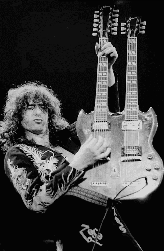 Terry O'Neill, ‘Jimmy Page playing his double neck Gibson’, 1975, Photography, Silver gelatin photograph, null,