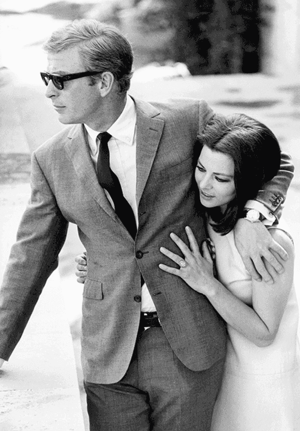 Terry O'Neill, ‘Michael Caine with Giovanna Ralli’, 1968, Photography, Lifetime Edition Gelatin Silver Print, null, Numbered