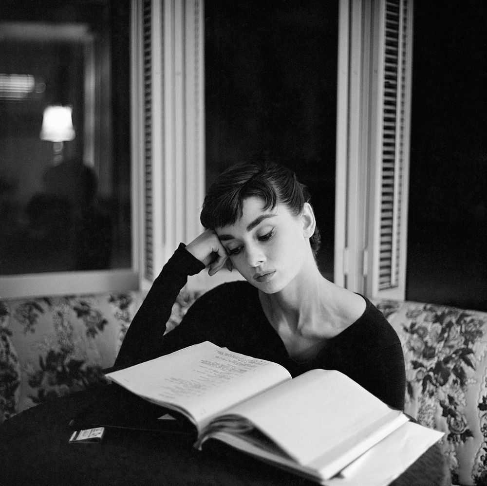 Mark Shaw, ‘Audrey Hepburn Supine Reading, Sitting Up,1953’, 1953, Print, Pigment print on Hahnemϋhle photo rag paper, null,