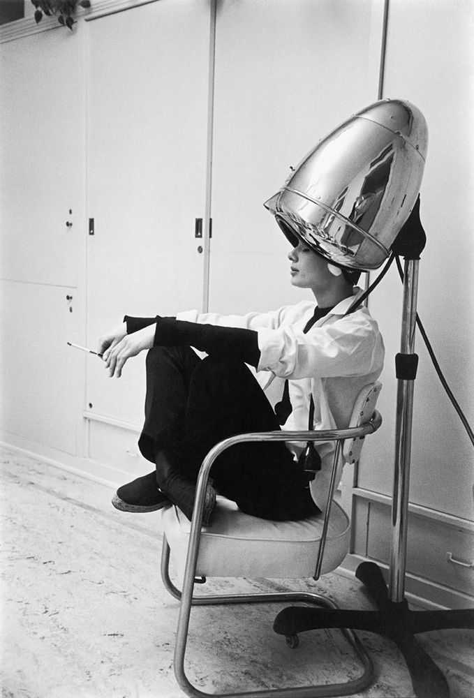 Mark Shaw, ‘Audrey Hepburn Under The Dryer Holding Cigarette Side View 1953’, 1953, Print, Pigment print on Hahnemϋhle photo rag paper, null,