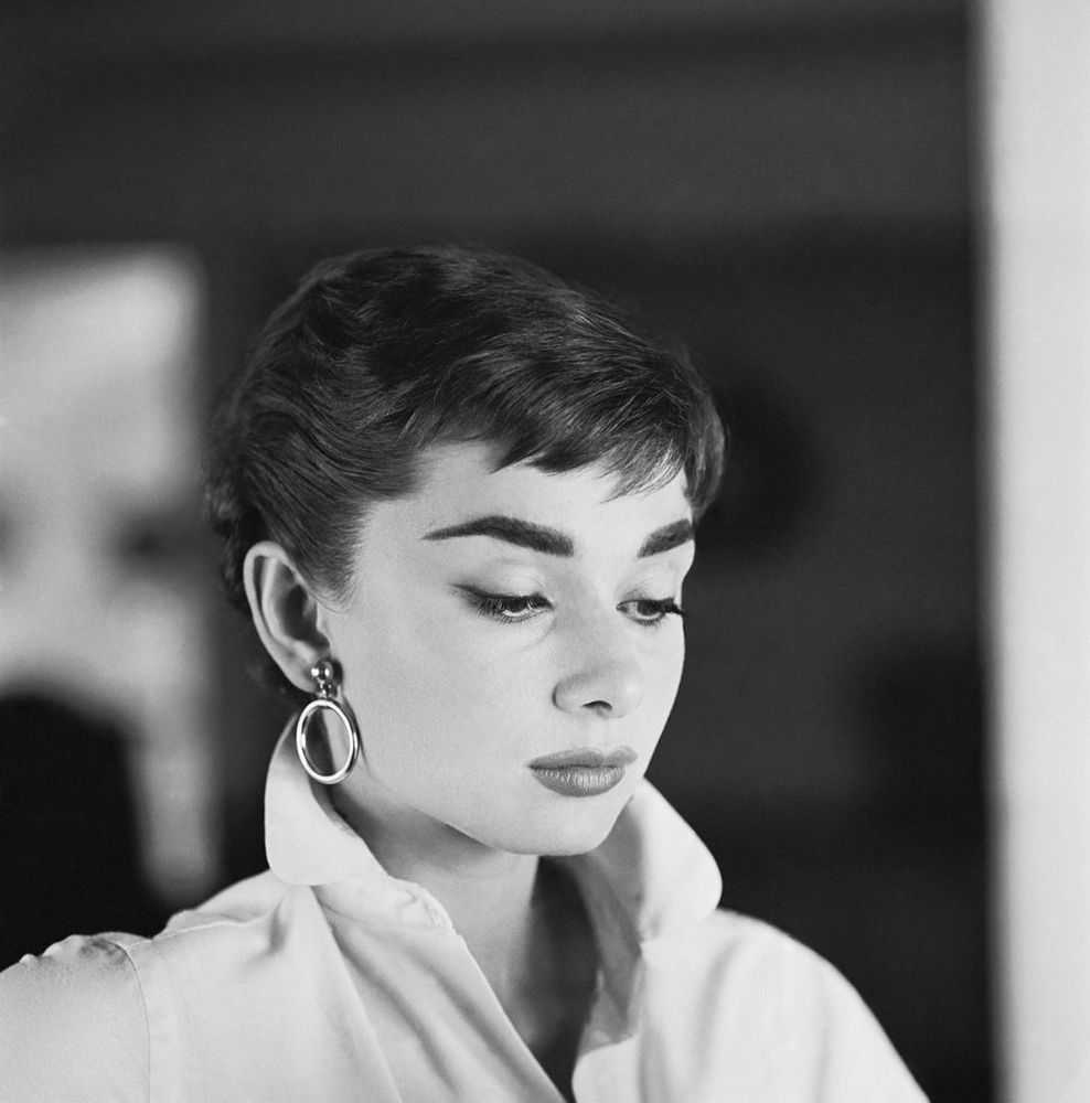 Mark Shaw, ‘Audrey Hepburn White Shirt Portrait, Glances Down, 1954’, 1954, Print, Pigment print on Hahnemϋhle photo rag paper, null,