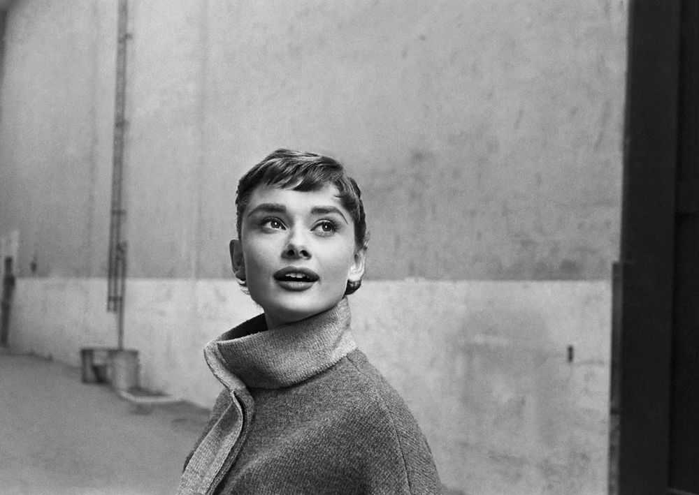 Mark Shaw, ‘Audrey Hepburn in Grey Turtleneck Sweater, Looking Up, 1953 #1’, 1953, Print, Pigment print on Hahnemϋhle photo rag paper, null,