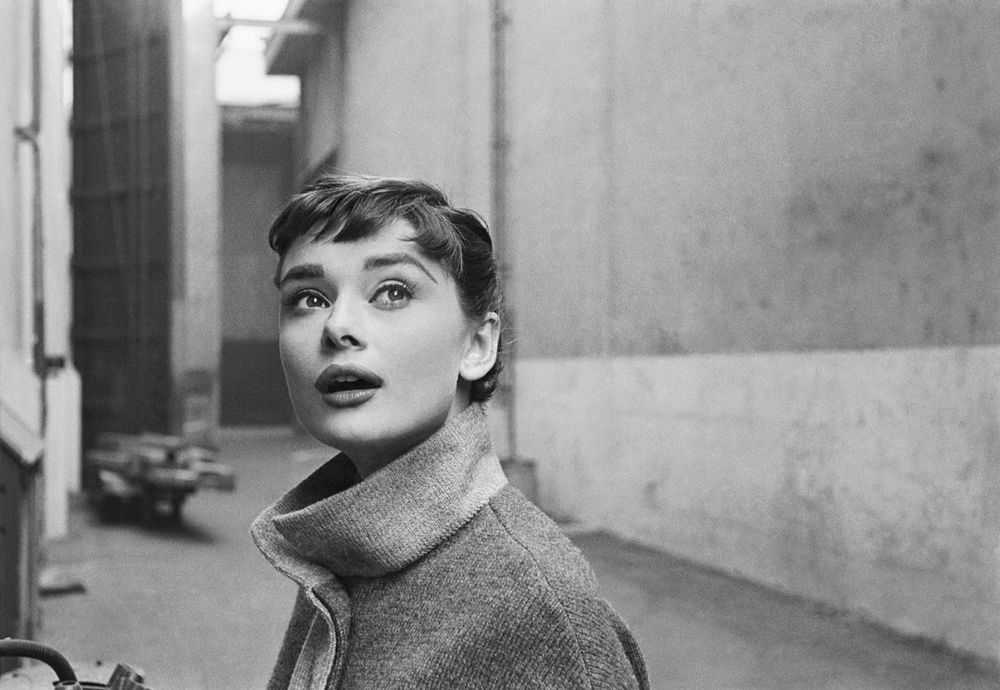 Mark Shaw, ‘Audrey Hepburn in Grey Turtleneck Sweater, Looking Up, 1953 #2’, 1953, Print, Pigment print on Hahnemϋhle photo rag paper, null,
