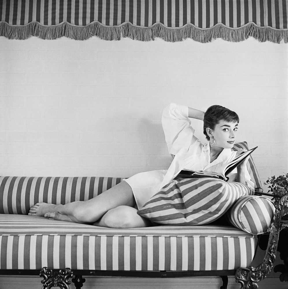 Mark Shaw, ‘Audrey Hepburn on Striped Sofa, Arm Back, Glances Right, 1954’, 1954, Print, Pigment print on Hahnemϋhle photo rag paper, null,