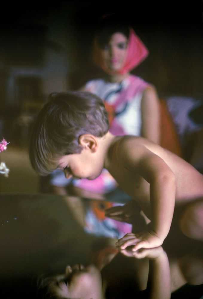 Mark Shaw, ‘Kennedy, John Jr. Looking at His Reflection in Tabletop, 1963’, 1963, Print, Pigment print on Hahnemϋhle photo rag paper, null,