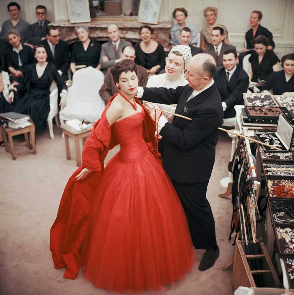 Mark Shaw, ‘Salon Dior, Christian Dior and Marguerite Carre in Center Adjust Victoire, 1954’, 1954, Print, Pigment print on Hahnemϋhle photo rag paper, null,